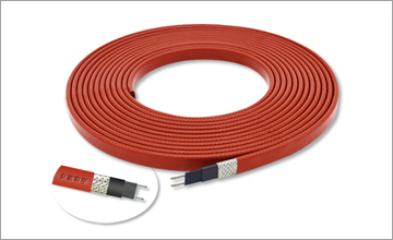 La cinta de cable calefactor eléctrico ayuda a aislar y proteger contra la congelación las tuberías de las válvulas en los árboles de extracción de petróleo